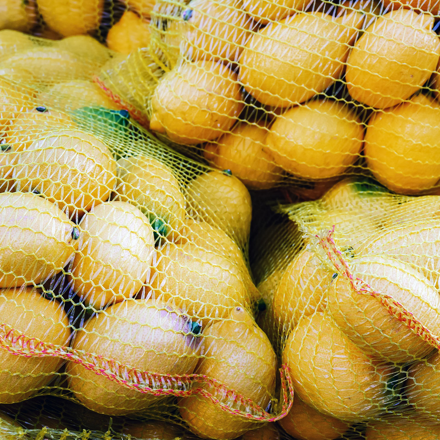 Saco Raschel amarilla limonera 35 cm x 58 cm 10 kg